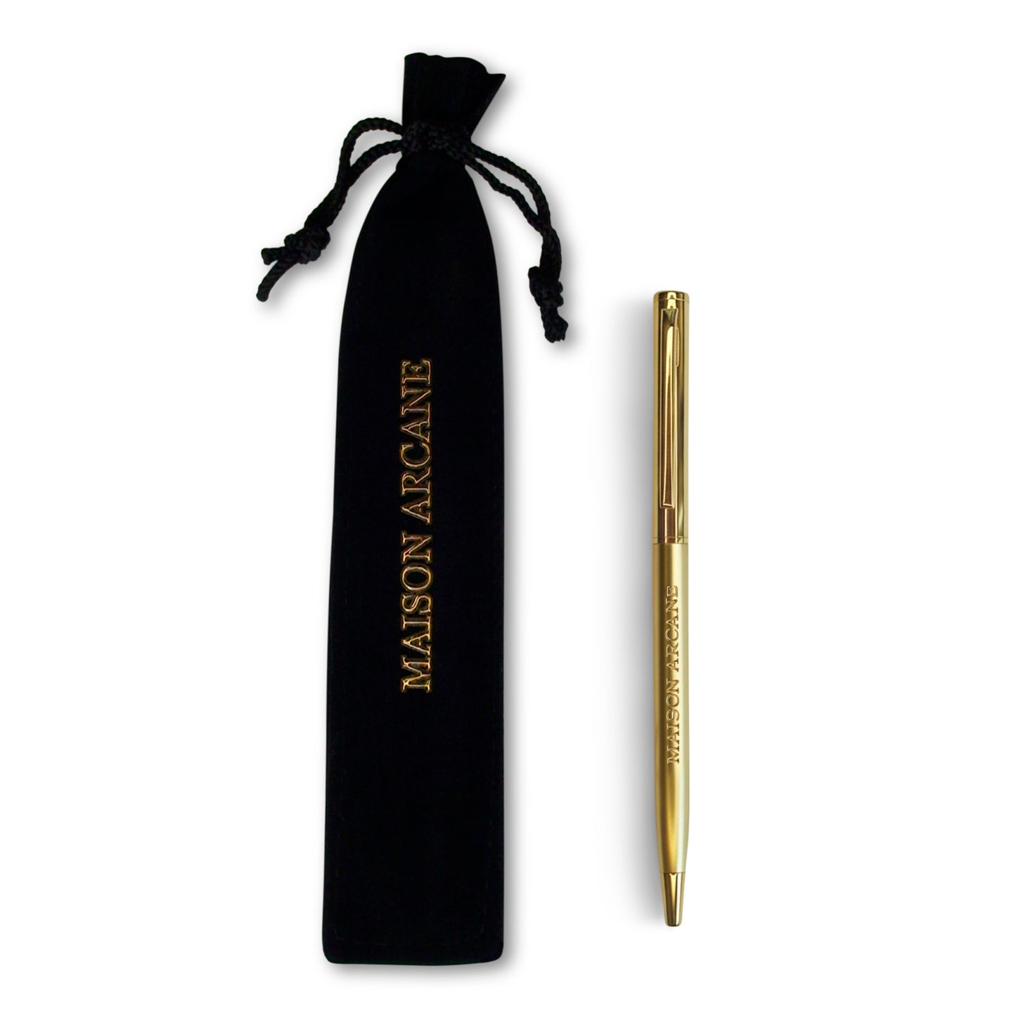 Stylo‑bille doré Maison Arcane présenté dans un écrin en velours noir, objet d’écriture de luxe.