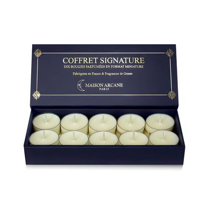 Coffret ouvert de dix bougies chauffe-plat parfumées Signature Maison Arcane, affichage des mini bougies pour découverte olfactive.