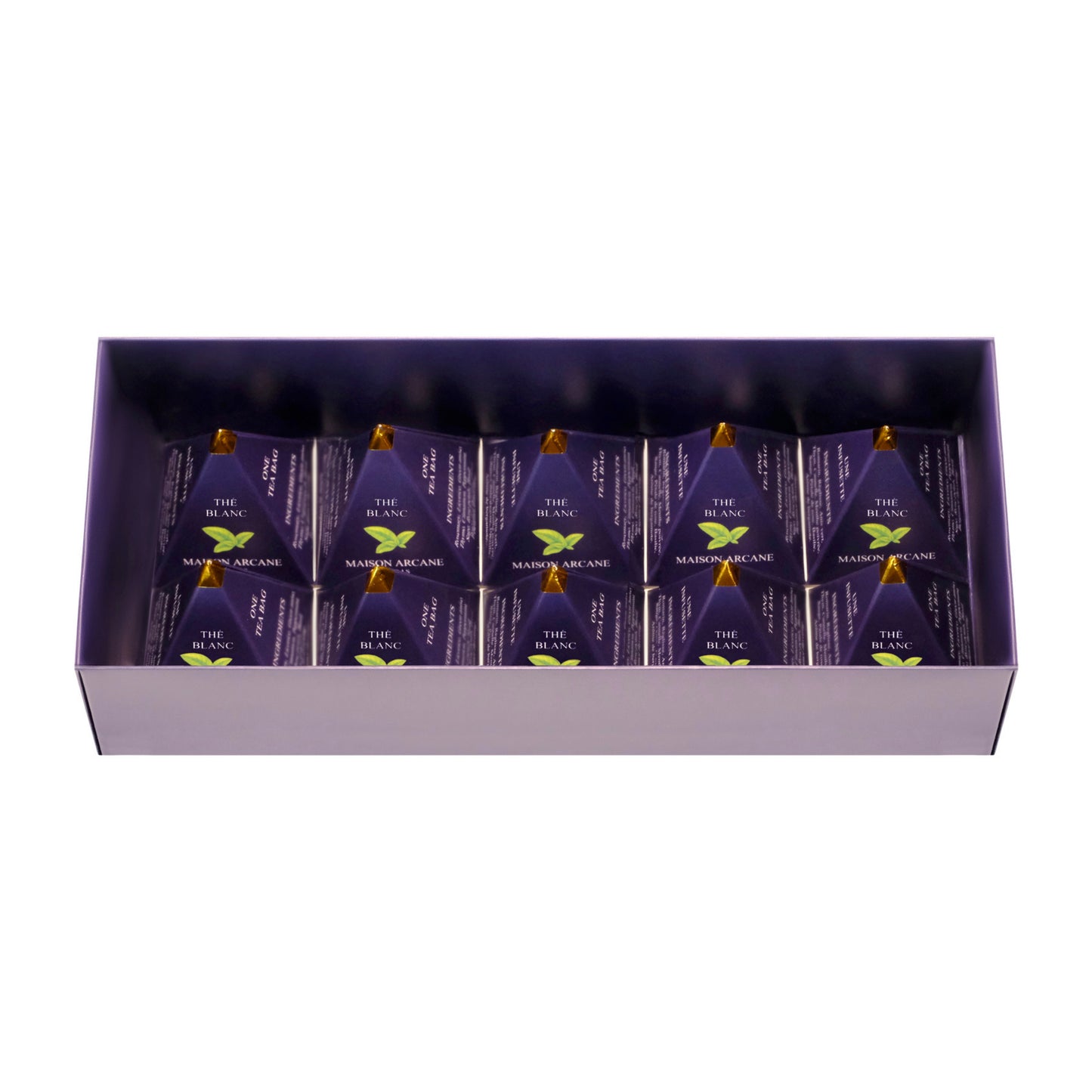 Coffret de thé blanc parfumé ouvert, présentation intérieure de dix infusettes pyramidales Maison Arcane.
