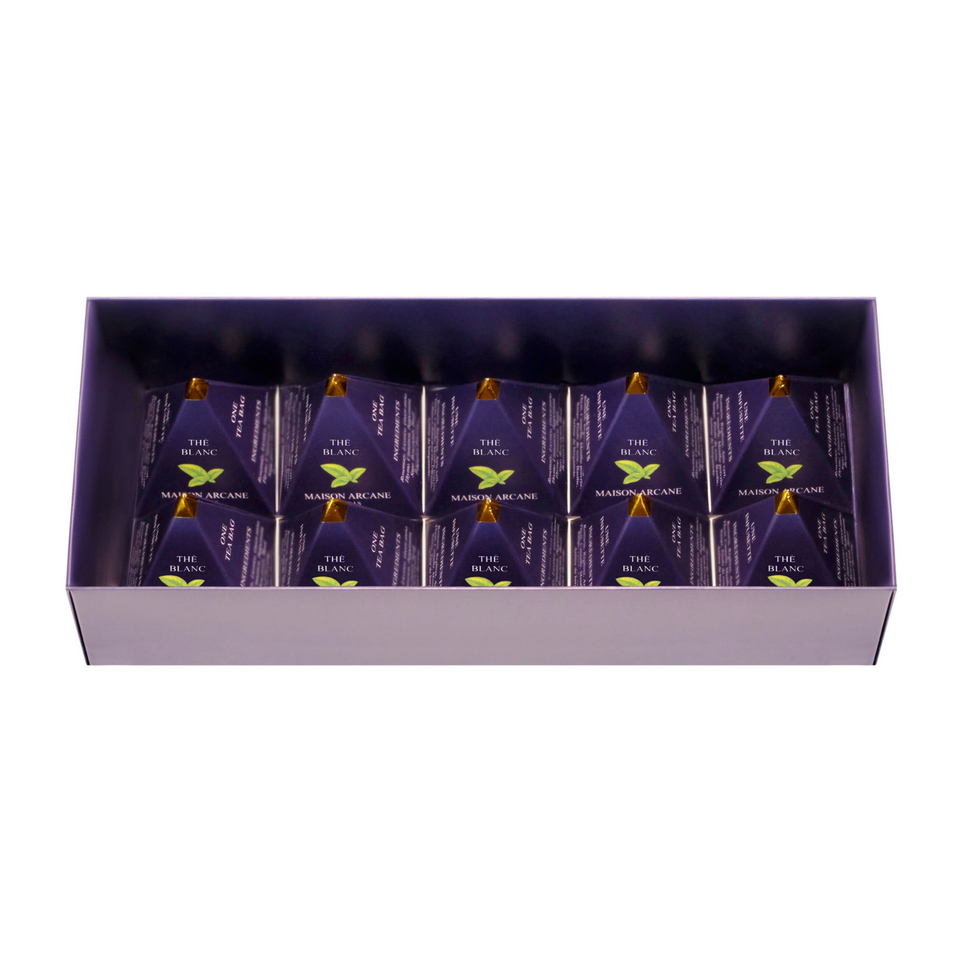 Coffret de thé blanc parfumé ouvert, présentation intérieure de dix infusettes pyramidales Maison Arcane.
