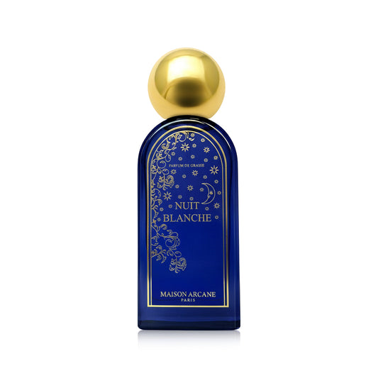 Parfum d’intérieur Nuit Blanche de Maison Arcane présenté dans un flacon bleu et doré, notes florales de tubéreuse.