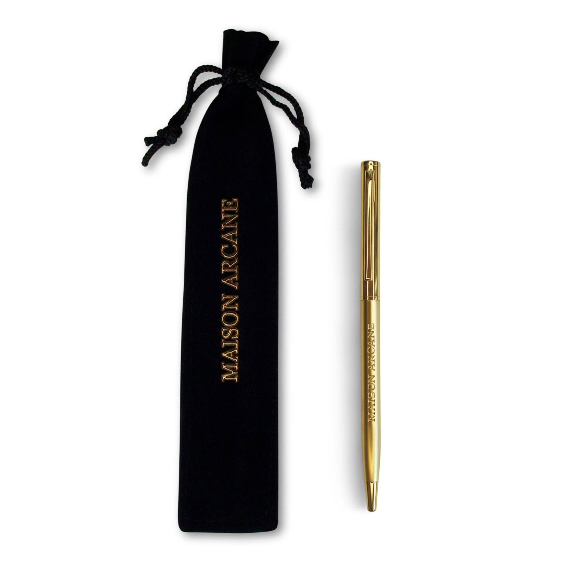 Stylo‑bille doré Maison Arcane présenté dans un écrin en velours noir, objet d’écriture de luxe.