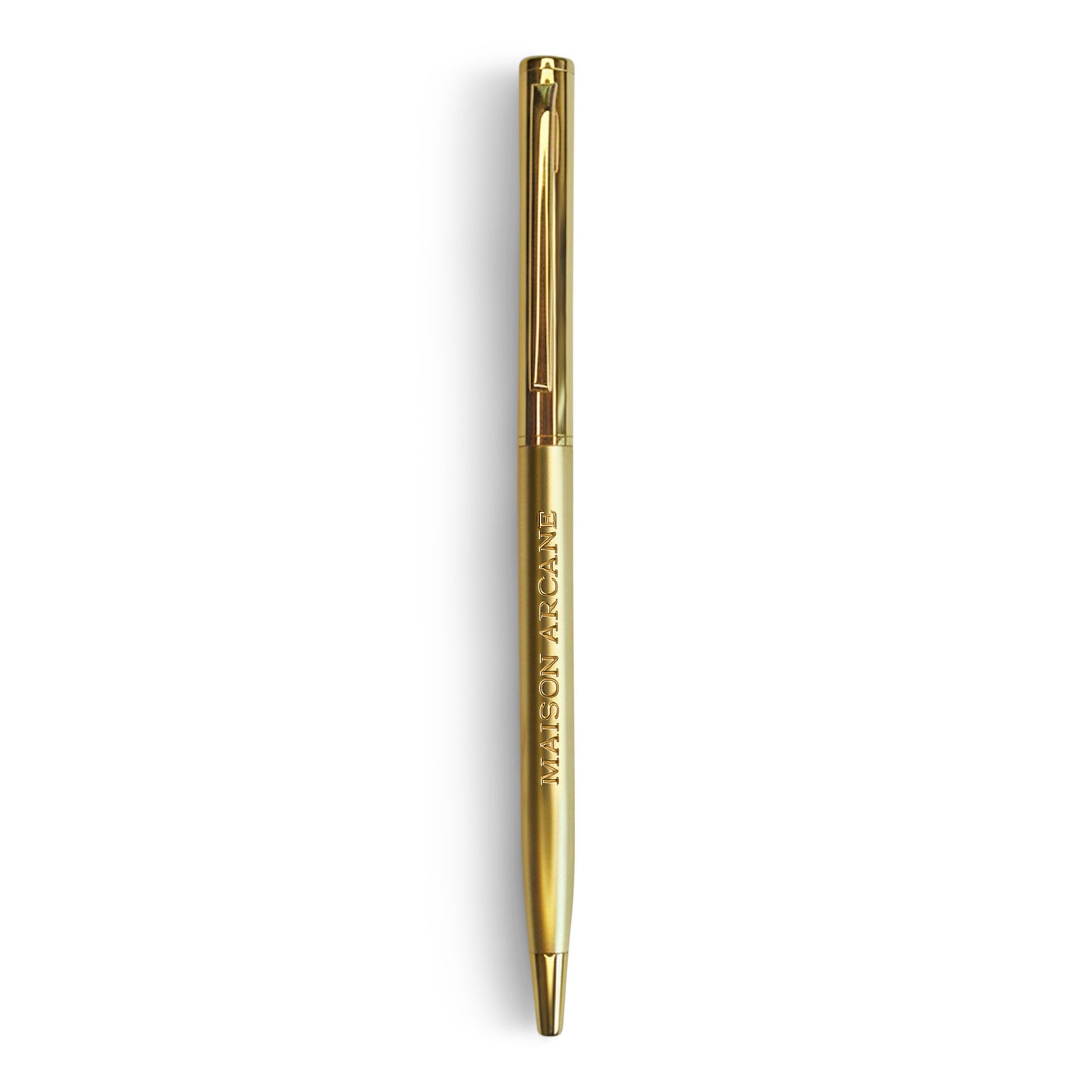 Stylo‑bille Maison Arcane gravé en métal haut de gamme, design premium pour une écriture fluide et raffinée.