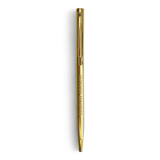Stylo‑bille Maison Arcane gravé en métal haut de gamme, design premium pour une écriture fluide et raffinée.